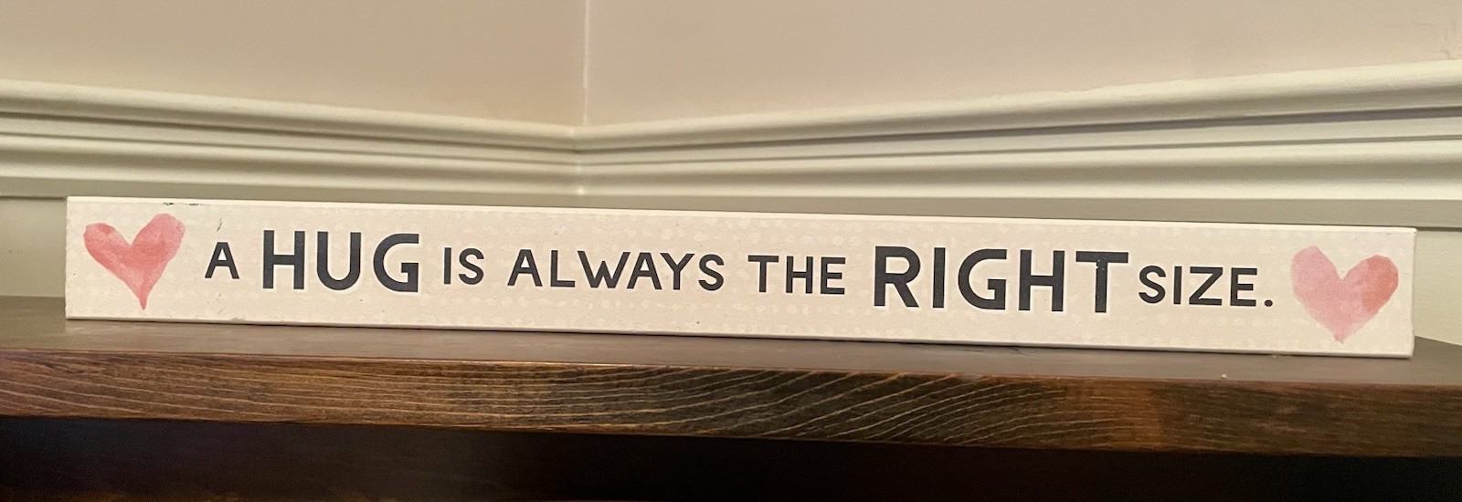 “A HUG IS ALWAYS THE RIGHT SIZE” Wooden Sign by Trademark Fine Art (15.5”)