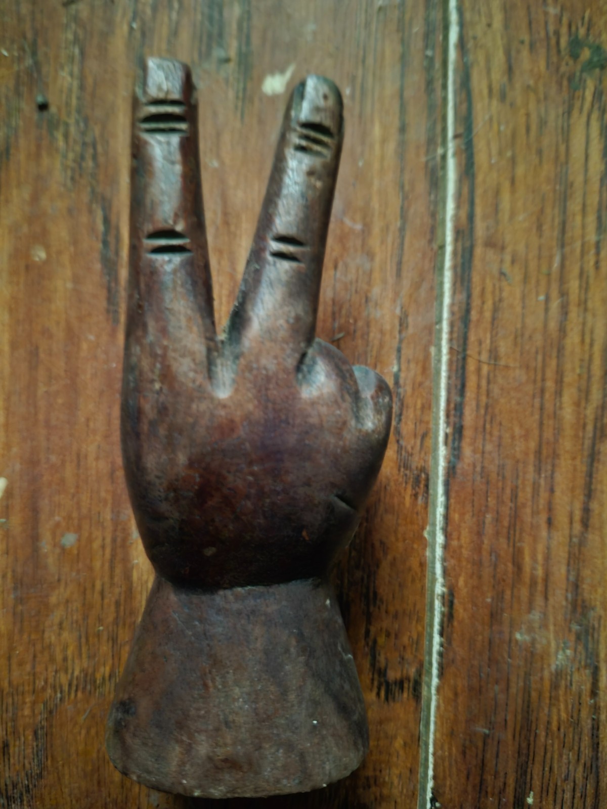 vintage wooden hand peace sign