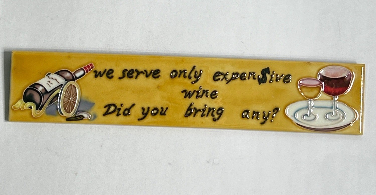 We Serve Only Expensive Wine Ceramic Wall Plaque Glossy Yellow Humor 16″x3″
