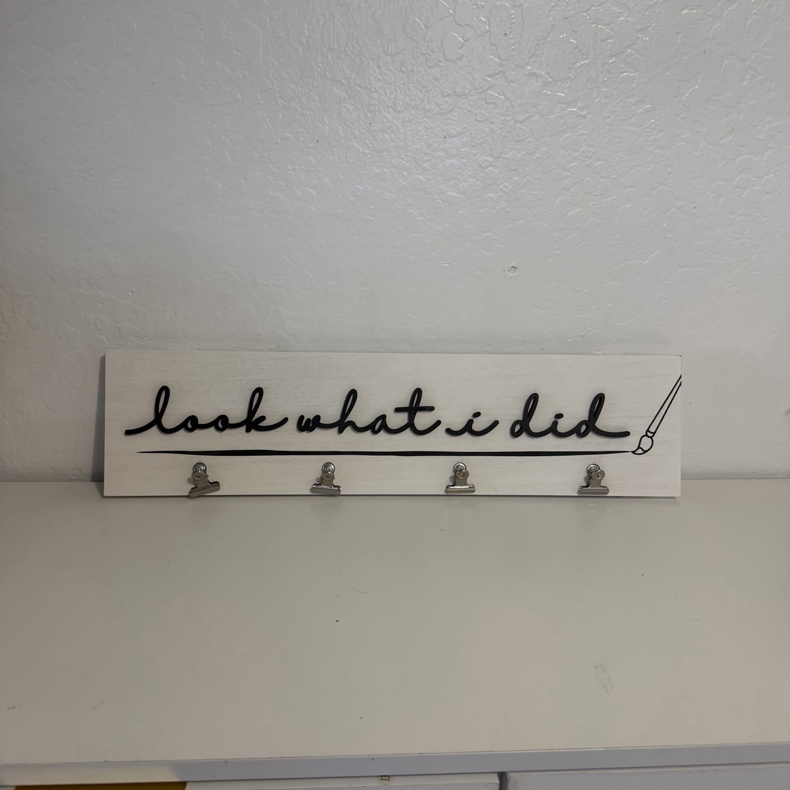 Kirkland’s White Wall Clip Display with Black Script “Look what I did” 24 X 6